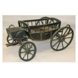 A LATE 19TH CENTURY PAINTED PONY CART, with seating, iron and leather suspension and four wooden