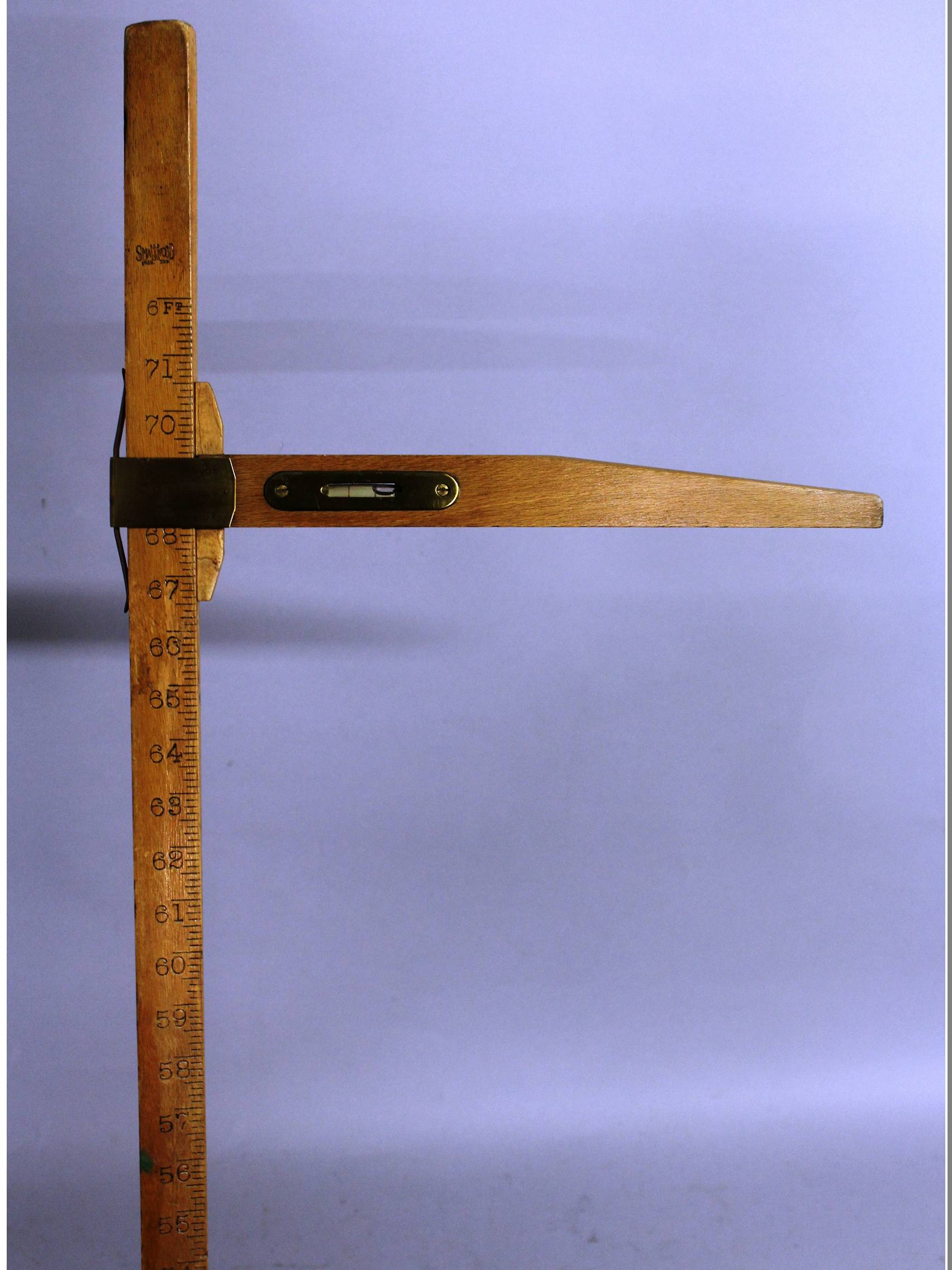 Rare horse measuring stick in wood with brass fittings by Smallwood.