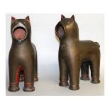 AN UNUSUAL PAIR OF BRONZE STANDING CATS, possibly SOUTH AMERICAN, of plain design with large open