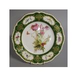 A ROYAL WORCESTER PLATE decorated with wild flowers by Edward Raby, date code for 1908.