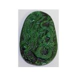 A GREEN JADE "DRAGON" PLAQUE. 3.5ins long.