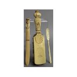 A GOOD FRENCH CARVED IVORY BRUSH with coronet, dagger and narrow scoop.