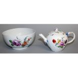 AN 18TH CENTURY MEISSEN TEAPOT AND COVER, the pot with basket-weave moulding painted with flowers,