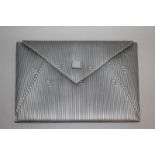 A GREY FENDI CLUTCH BAG.