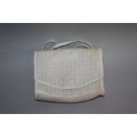 A SMALL FENDI WHITE SHOULDER BAG.