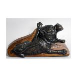 AN UNUSUAL BRONZE OF A DOG, mouth wide open, mounted on a wooden stand and dated 1889. 13ing long.