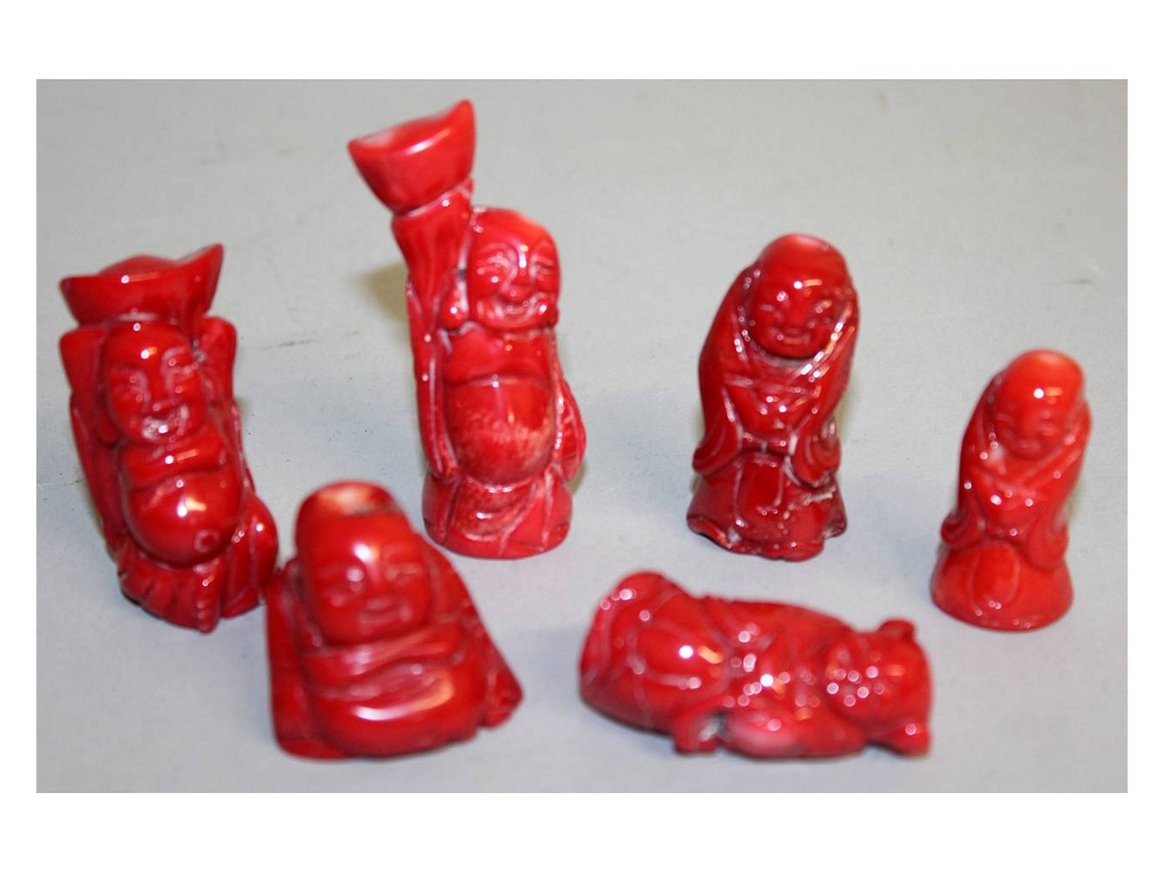 SIX SMALL CARVED CHINESE FIGURES.