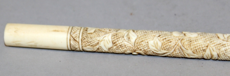 A 19TH/20TH CENTURY CHINESE CARVED IVORY STICK, decorated in low relief with scrolling foliage, 11. - Image 6 of 8