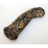 A 19TH CENTURY INDONESIAN CARVED & GILT WOOD KRIS HANDLE, of traditional form with traces of gilt