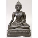A 19TH/20TH CENTURY THAI BRONZE FIGURE OF BUDDHA, seated in meditation on a shaped lotus plinth,