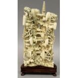 A GOOD QUALITY EARLY 20TH CENTURY CHINESE CARVING, together with a fitted wood stand, the semi-