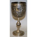 A GOOD LATE 19TH CENTURY CHINESE EMBOSSED SILVER GOBLET, decorated with a continuous scene of