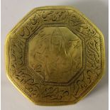 A 19TH CENTURY PERSIAN QAJAR ENGRAVED BRONZE BOX, of octagonal section, decorated with figural