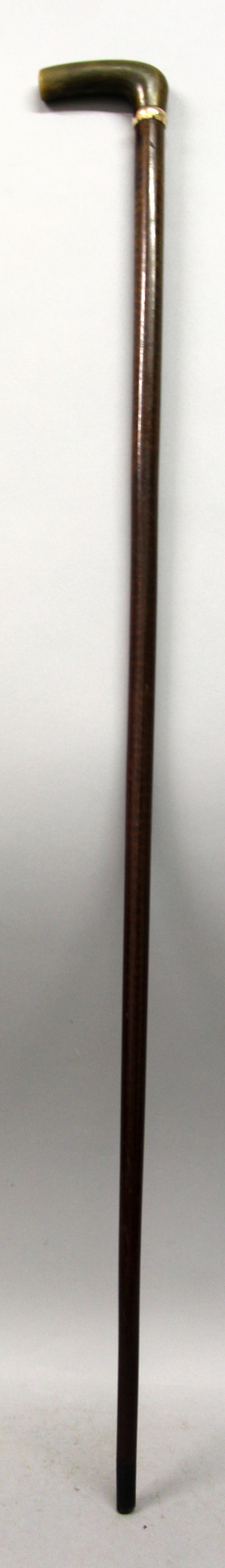 A FINE QUALITY RHINOCEROS HORN HANDLED SNAKE WOOD WALKING STICK, with a monogram engraved gilt-metal - Image 2 of 8