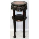 A 19TH CENTURY CHINESE TALL CIRCULAR MARBLE TOP HARDWOOD STAND, with a single plain undertier, the