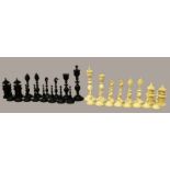A FINE QUALITY EARLY 19TH CENTURY ANGLO-INDIAN VIZAGAPATUM IVORY & HORN CHESS SET, complete and with