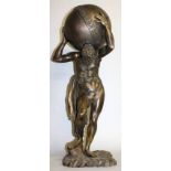 AFTER THE ANTIQUE A LARGE BRONZE OF ATLAS HOLDING THE WORLD. 33ins high.