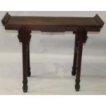 A GOOD QUALITY 19TH CENTURY CHINESE CARVED HARDWOOD ALTER TABLE, with scroll end top, the frieze