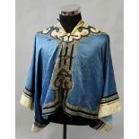 A 19TH CENTURY CHINESE BLUE GROUND LADIES SILK JACKET, with cream ground embroidered collar and