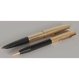 TWO PARKER PENS with gold nibs.