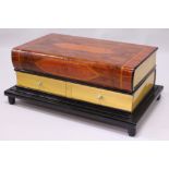 AN UNUSUAL ART DECO STYLE COFFEE TABLE, modelled as two large books, with two drawers to each