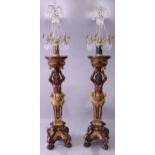 A GOOD PAIR OF TORCHERE STYLE CANDELABRA, the six branch candelabras having cut glass prisms and