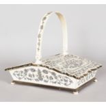 A GOOD ANGLO INDIAN IVORY COVERED BASKET, with carrying handle and two lift up lids, supported on