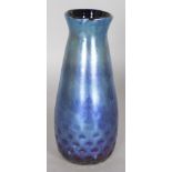 A ST CLAIR SPECKLED BLUE GLASS VASE. Signed ST CLAIR. 8ins high.