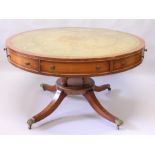 A GOOD SHERATON REVIVAL SATINWOOD DRUM TABLE, with gilt tooled leather inset top, foliate painted