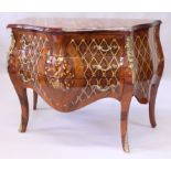 A LOUIS XVI STYLE KINGWOOD COMMODE, of bombe form, with marquetry inlay and ormolu mounts, the three