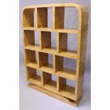 AN ART DECO STYLE BIRDSEYE MAPLE OPEN BOOK/DISPLAY SHELVES, with rounded top, "pigeonhole" style