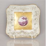 A GOOD MEISSEN SQUARE SHAPED DISH, the gilt centre with a circular sepia scene, surrounded by