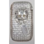 A NOVELTY SILVER CAT TO SCRATCH VESTA.