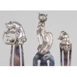 THREE SILVER NOVELTY CAT BOOK MARKERS.