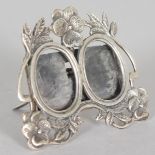 A MINIATURE SILVER DOUBLE FRAME.