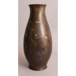 A GOOD QUALITY JAPANESE MEIJI PERIOD MIXED METAL INLAID & ONLAID BRONZE VASE, the sides incised with