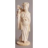 A FINE QUALITY SIGNED JAPANESE MEIJI PERIOD TOKYO SCHOOL IVORY OKIMONO OF A MOTHER & HER SON, the