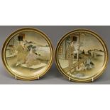 A PAIR OF SIGNED JAPANESE SATSUMA EARTHENWARE DISHES, circa 1900, each painted with a scene of