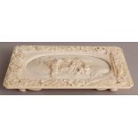 A FINE QUALITY SIGNED JAPANESE MEIJI PERIOD RECTANGULAR IVORY TRAY, with indented corners and