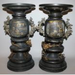 A GOOD PAIR OF JAPANESE MEIJI PERIOD GILT & SILVER INLAID SECTIONAL BRONZE VASES, each base with