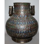 A LARGE JAPANESE MEIJI PERIOD CHAMPLEVE BRONZE ARROW VASE, of Hu form, the sides with bands of