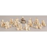 A GROUP OF TWELVE SMALL EARLY 20TH CENTURY JAPANESE SECTIONAL IVORY FIGURES, mainly of artisans