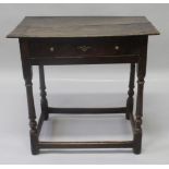 AN 18TH CENTURY OAK SIDE TABLE, with a twin plank top, single frieze drawer, supported on turned