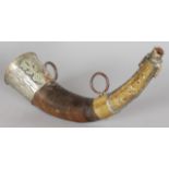 AN ISLAMIC COPPER MOUNTED HORN FLASK. 12ins long.