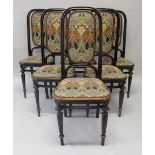 A SET OF SIX THONET CHAIRS, with ebonised Bentwood frames, the backs and seats upholstered with an