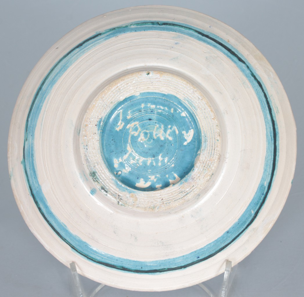 QUENTIN BELL POTTERY, FULHAM (1910-1996) A CIRCULAR POTTERY BOWL, painted head of a girl in blue and - Image 2 of 2