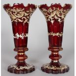 A PAIR OF RUBY GLASS TRUMPET SHAPED VASES, LATE 19TH CENTURY, with gilded and enamel decoration.