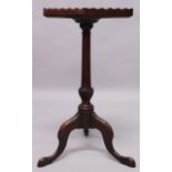 A GEORGE III MAHOGANY URN STAND, with a galleried square top, turned column support, with tripod