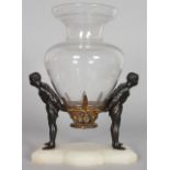 AN UNUSUAL VASE OR CENTRPIECE, 19th Century with a bulbous glass vase supported by a pair of