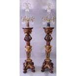 A GOOD PAIR OF TORCHERE STYLE CANDELABRA, the six branch candelabras having cut glass prisms and